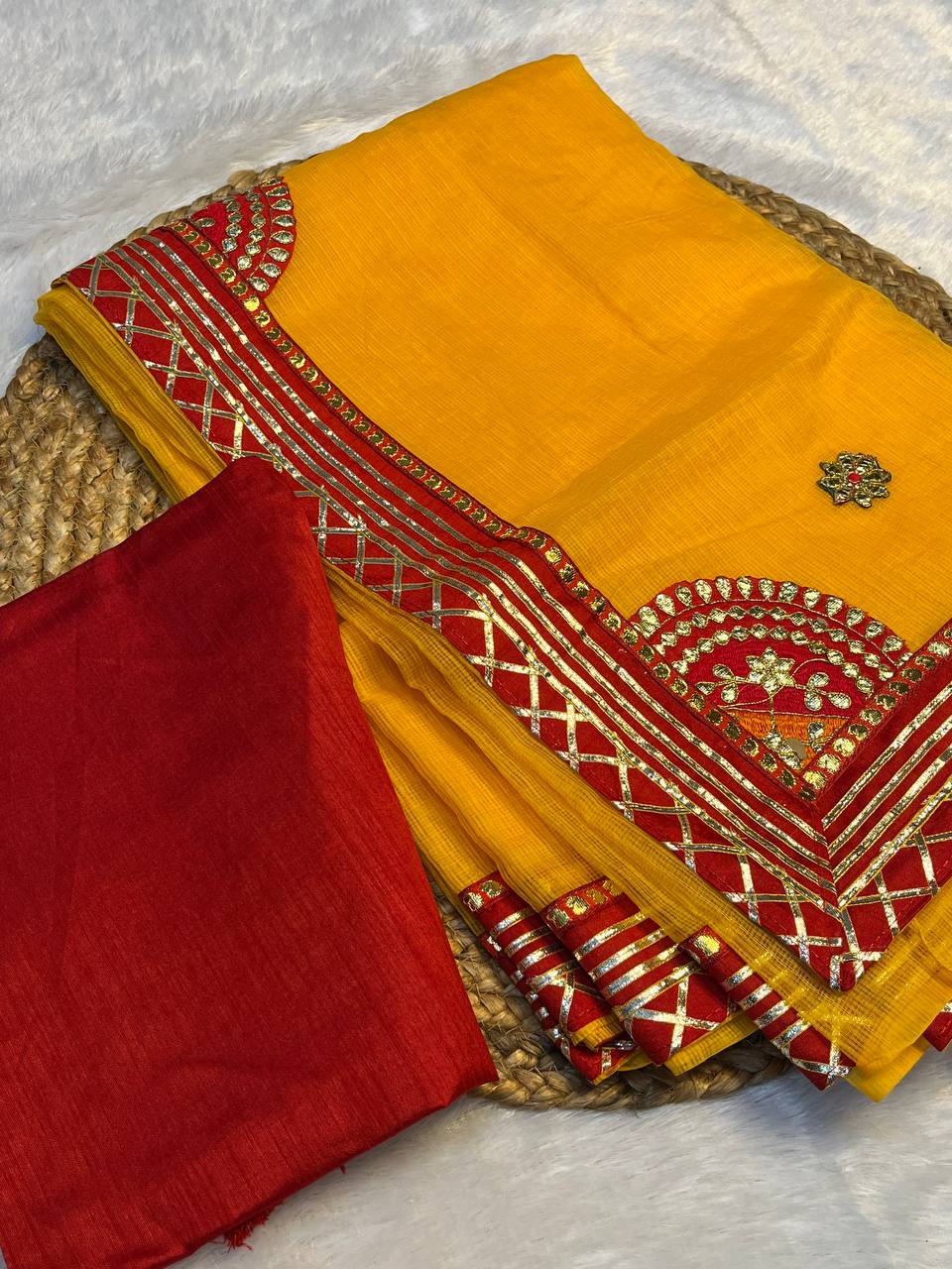 yellow Bandhani saree with golden detailing