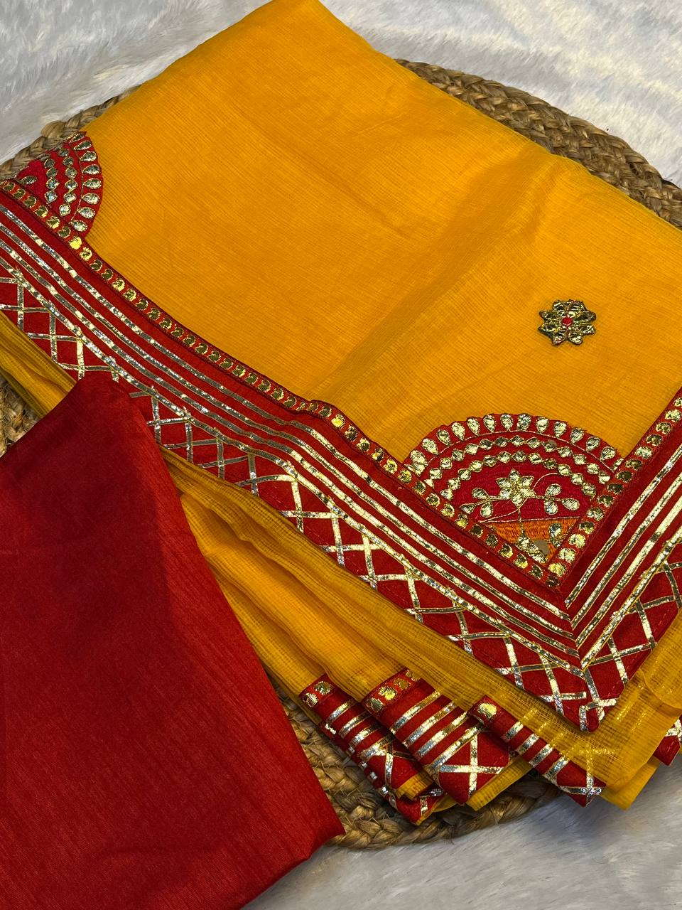 yellow Bandhani saree with golden detailing